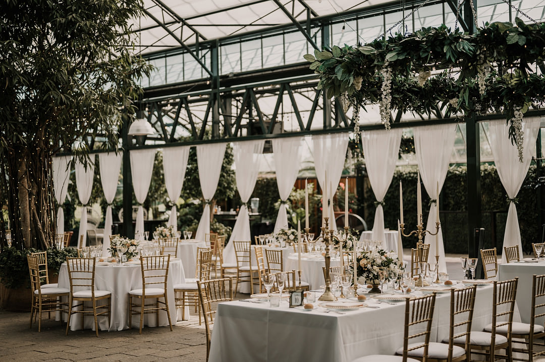 Long Tables Blue Cloth Candelabra Blush Flowers Gold Decor Planterra Conservatory Wedding Yana B Photographer