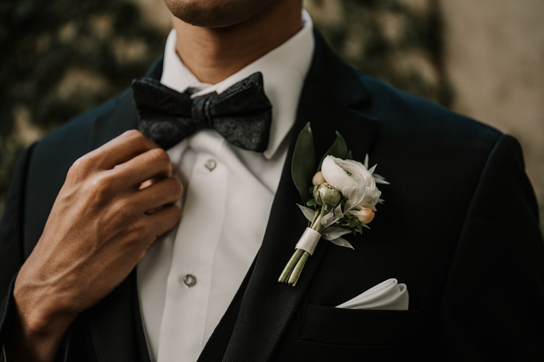 Groom Black Tuxedo Bow Tie Buttonhole Flower Planterra Conservatory Wedding Yana B Photographer