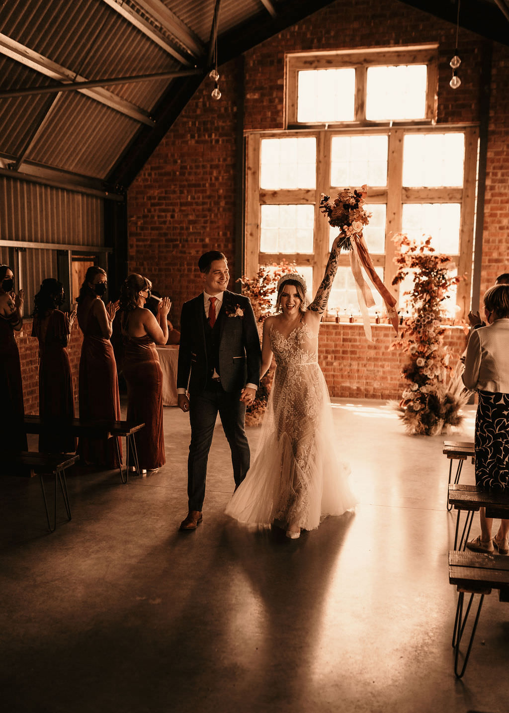 Newly Wed Couple Cheering Beer Garden Wedding Photos By Hash