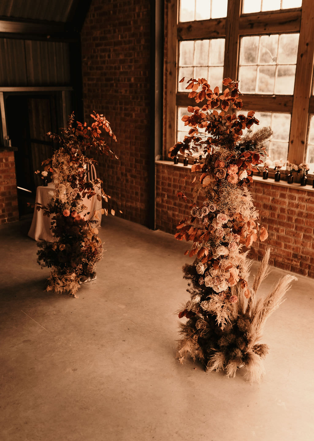 Flower Installation Backdrop Rust Orange Pampas Grass Beer Garden Wedding Photos By Hash