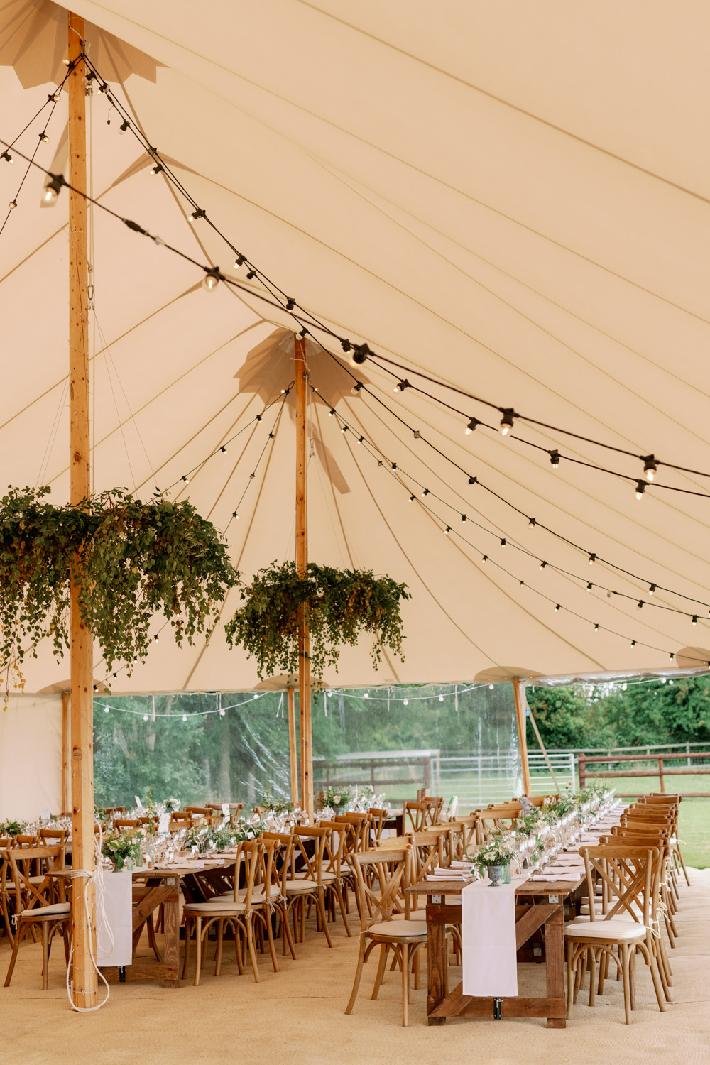 Festoon Lights Wooden Tables Greenery Hoops Decor Cotswolds Marquee Wedding Captured by Katrina