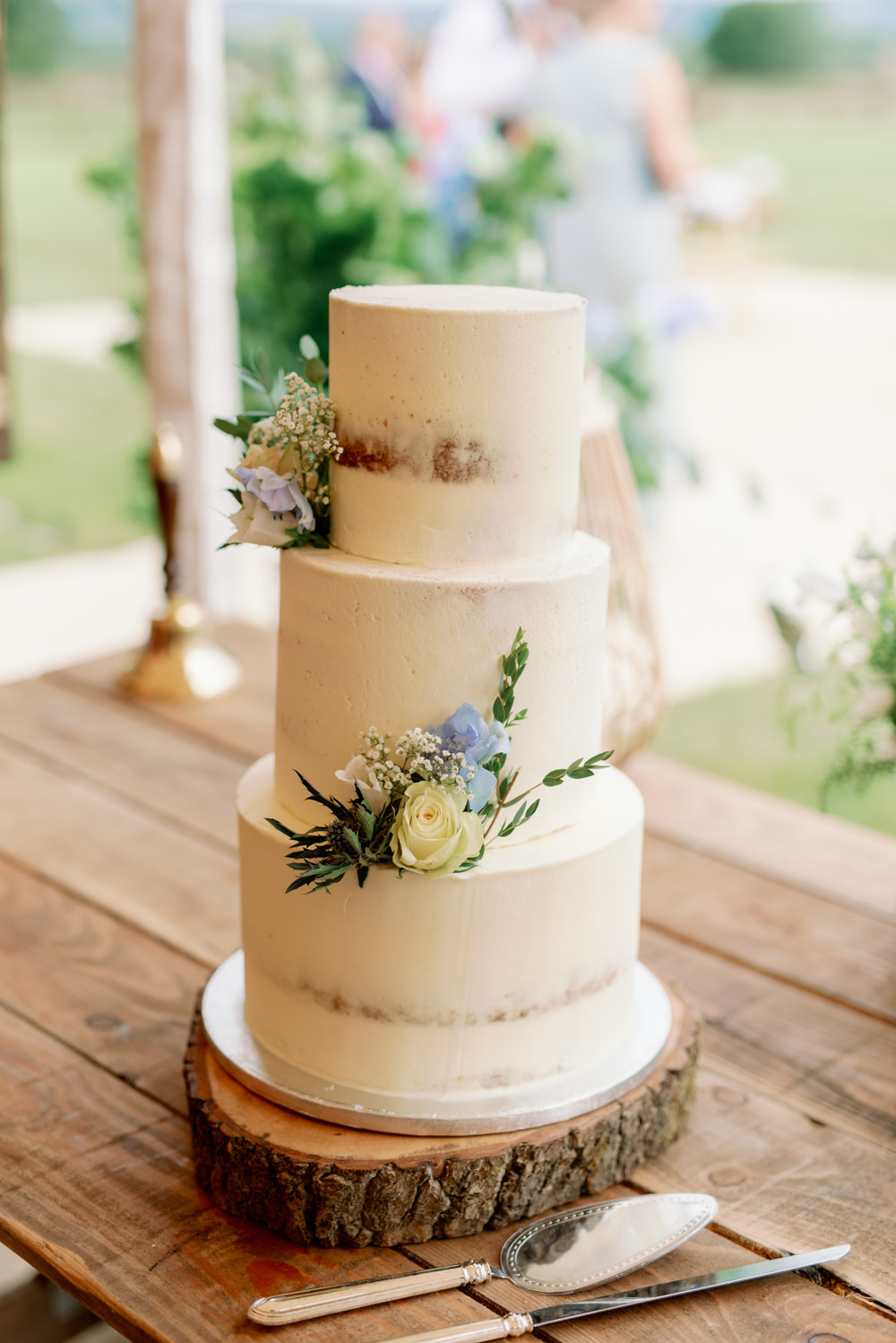 Semi Naked Cake Flowers Log Slice Stand Cotswolds Marquee Wedding Captured by Katrina