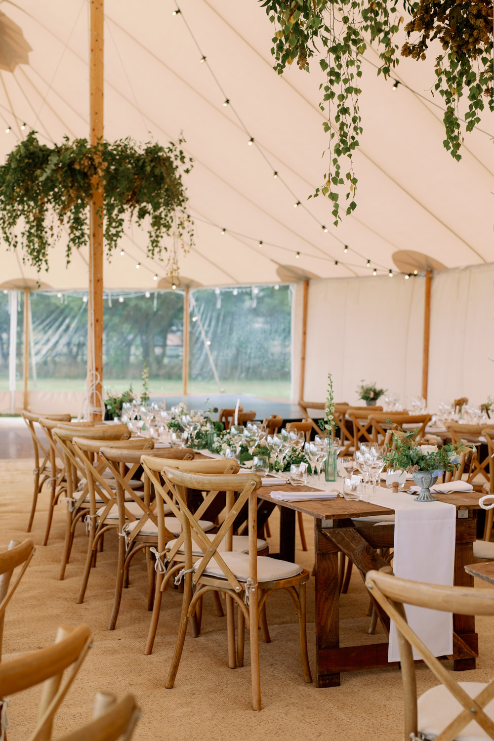 Festoon Lights Wooden Tables Greenery Hoops Decor Cotswolds Marquee Wedding Captured by Katrina