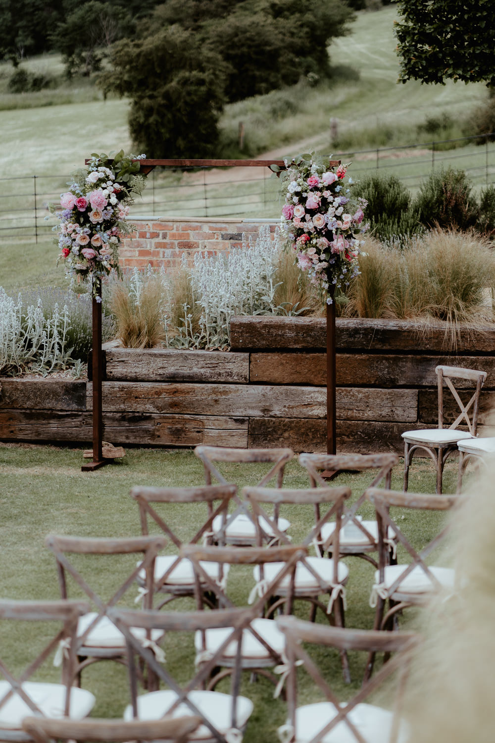 Flower Arch Backdrop Ceremony Pink Blue Fairoaks Wedding Patrick Partridge Photography