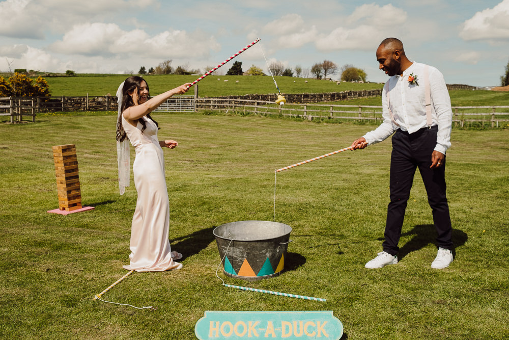 Fete Games Hook A Duck Festival Yurt Wedding Scott Carney Photography