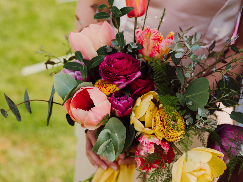 Bouquet Flowers Bride Bridal Spring Tulip Orange Yellow Pink Festival Yurt Wedding Scott Carney Photography
