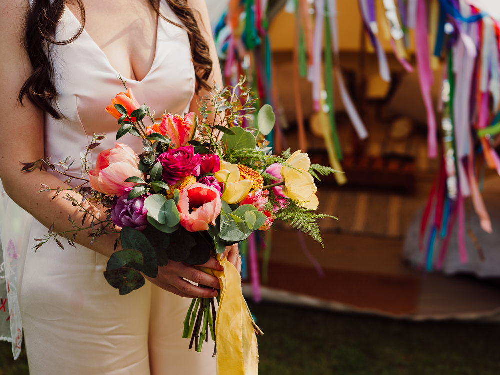 Bouquet Flowers Bride Bridal Spring Tulip Orange Yellow Pink Festival Yurt Wedding Scott Carney Photography