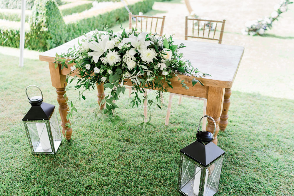 Ceremony Table Flowers Lanterns Candles Helmingham Hall Wedding Gemma Giorgio Photography