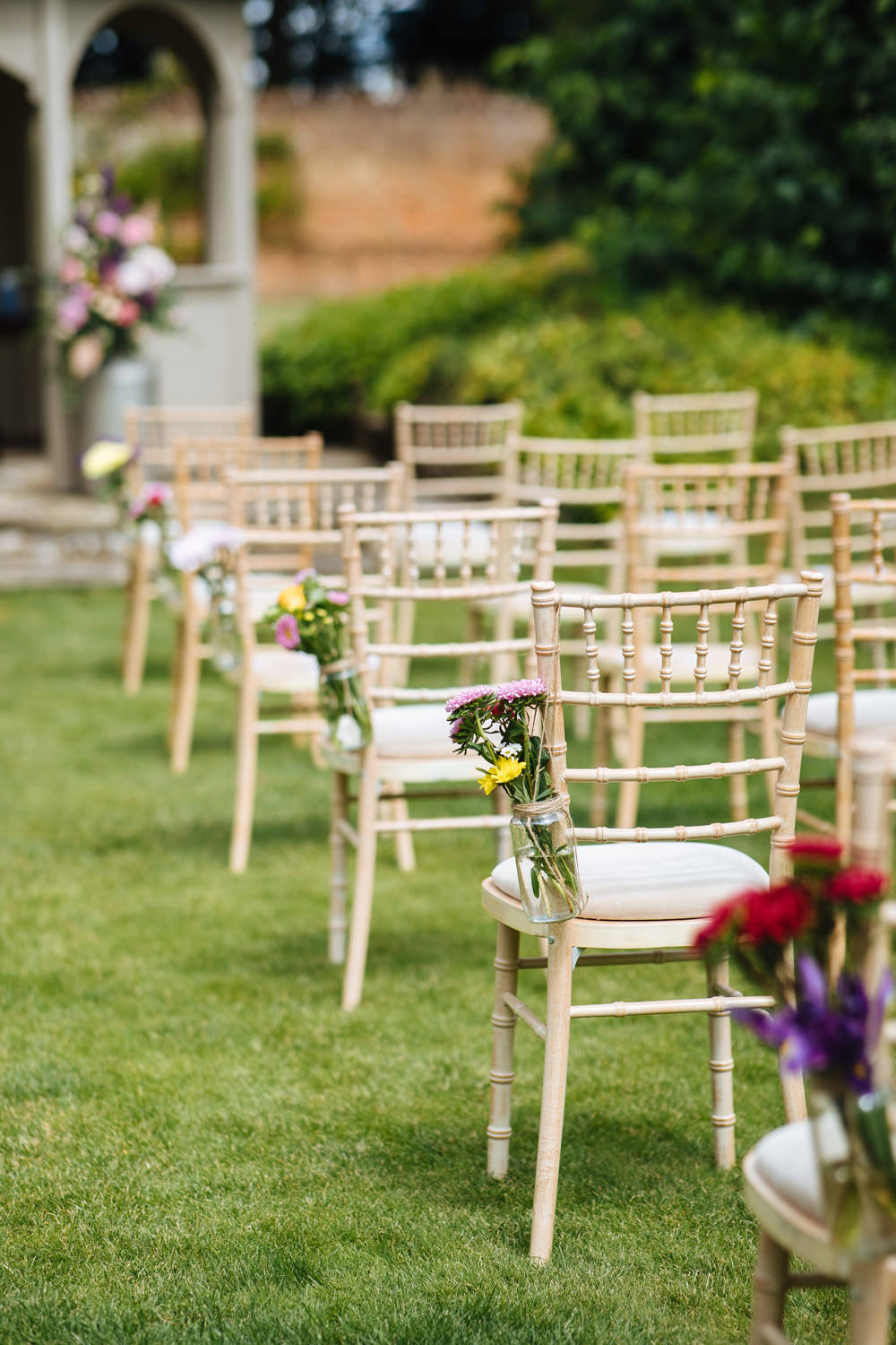 Flowers Hook Bottle Aisle Chairs Lynsted Park Wedding Laura Debourde Photography