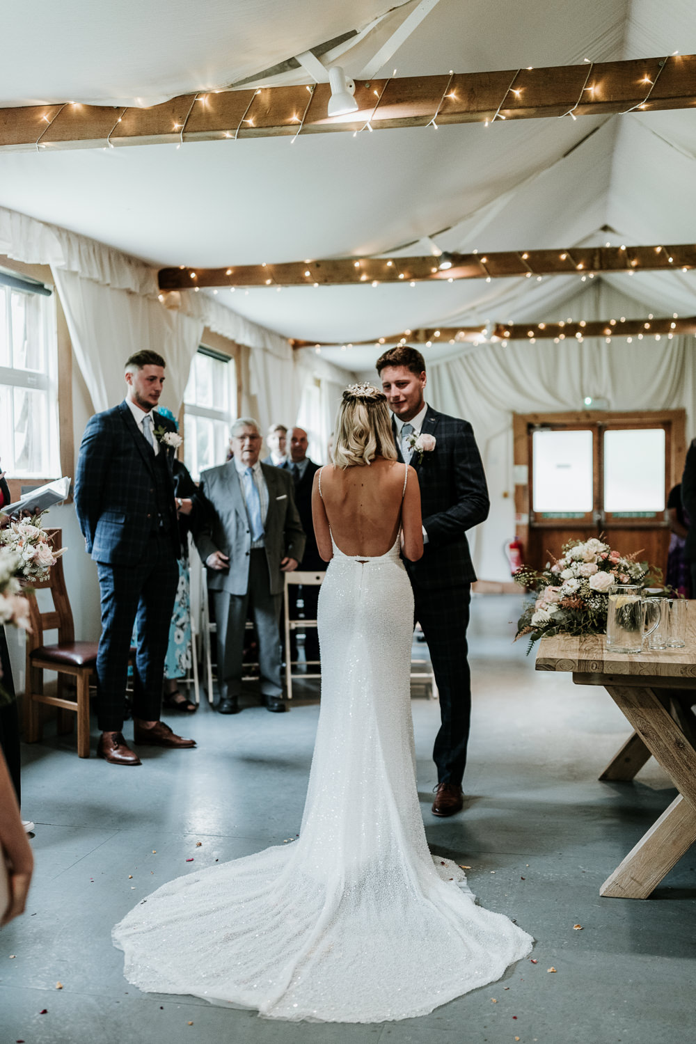 Barn Ceremony Fairy Lights Made With Love Lola Wedding Dress Annie Bradney Photography