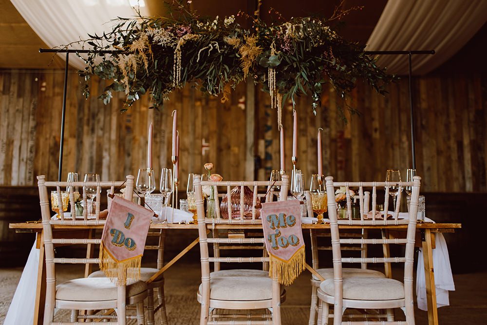 Wooden Table Pink Candles Decor Suspended Flowers Greenery Montague Farm Wedding Jessica Bevan Photography