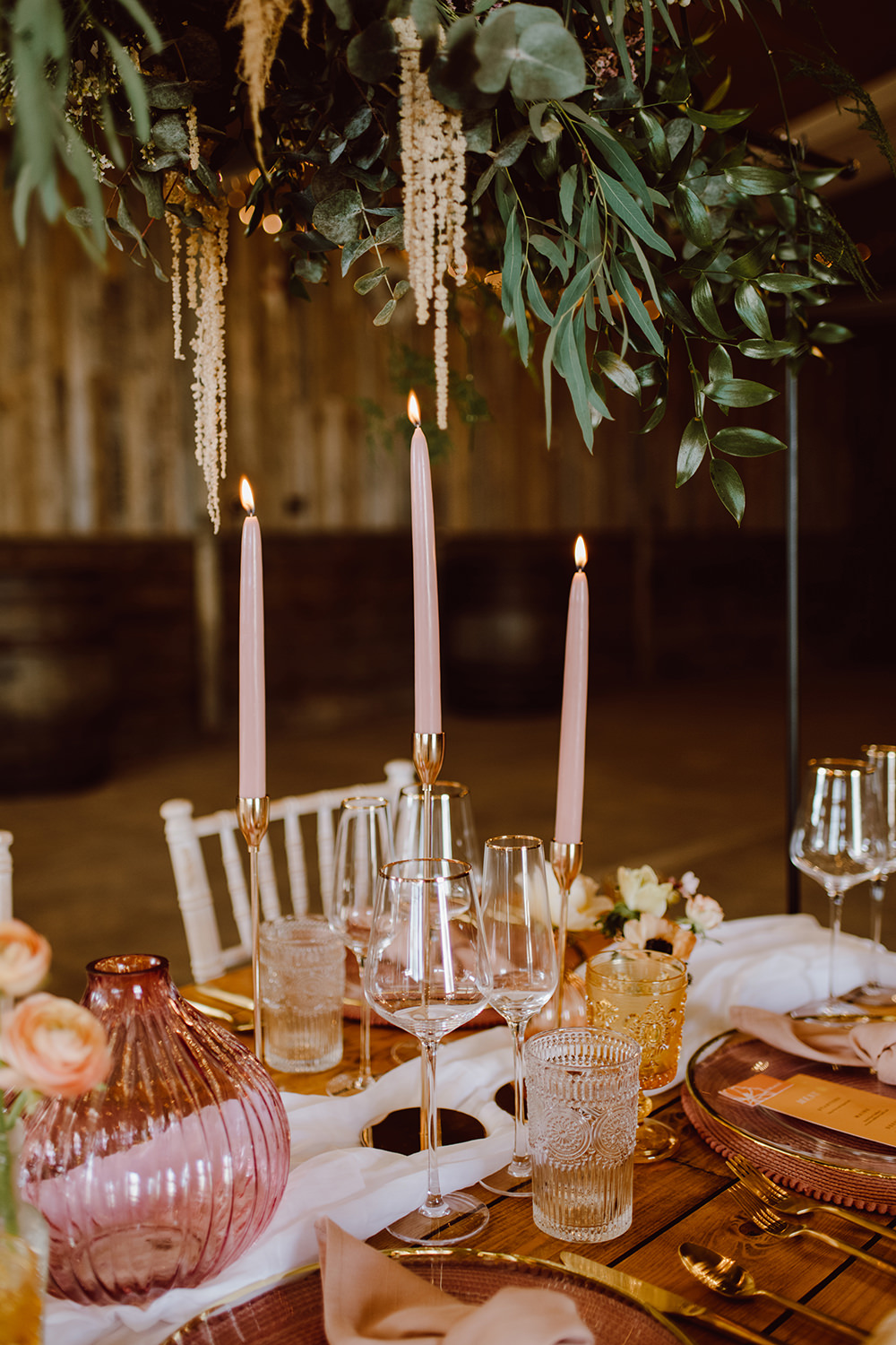 Wooden Table Pink Candles Decor Suspended Flowers Greenery Montague Farm Wedding Jessica Bevan Photography