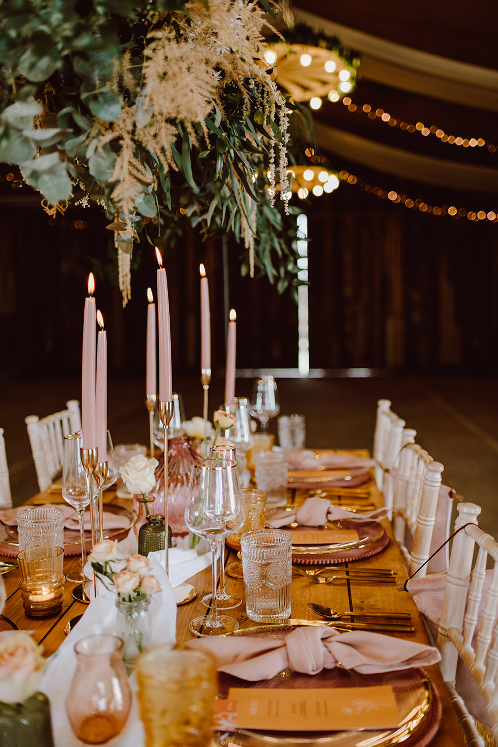 Wooden Table Pink Candles Decor Suspended Flowers Greenery Montague Farm Wedding Jessica Bevan Photography
