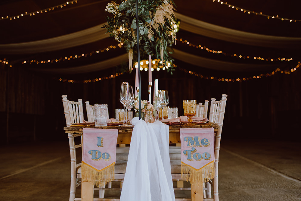 Wooden Table Pink Candles Decor Suspended Flowers Greenery Montague Farm Wedding Jessica Bevan Photography