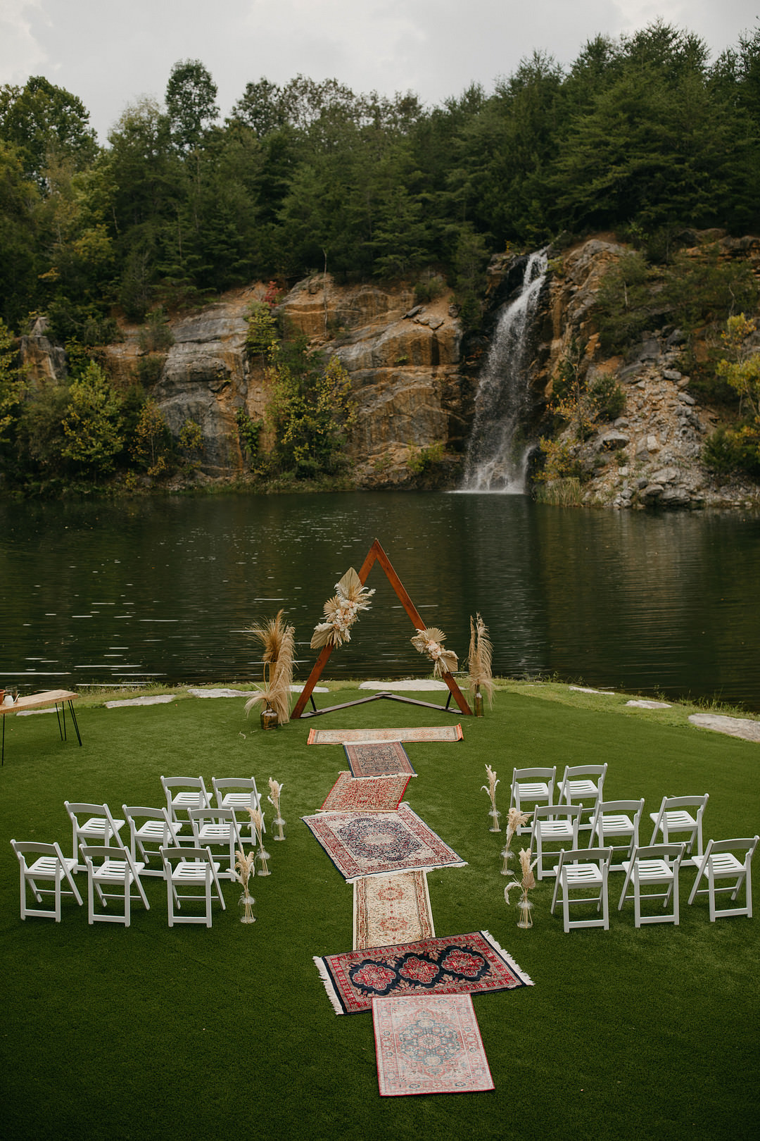 Ceremony Aisle Triangle Arch Pampas Grass Mismatched Rugs Tennessee Lake Wedding Eastlyn & Joshua