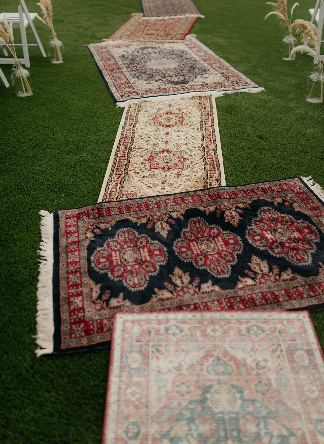 Ceremony Aisle Triangle Arch Pampas Grass Mismatched Rugs Tennessee Lake Wedding Eastlyn & Joshua