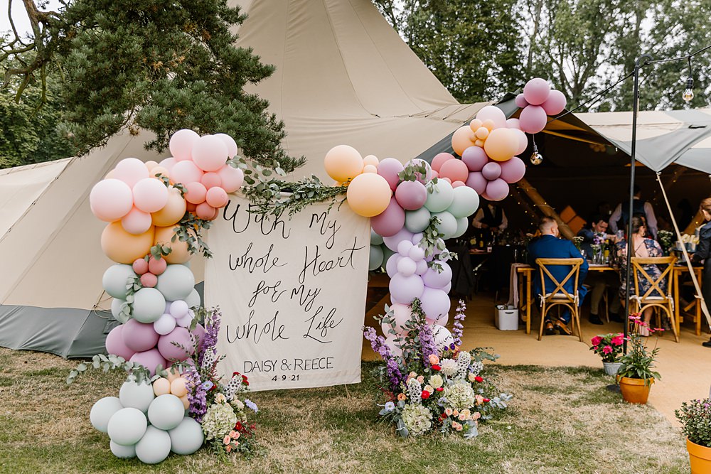 Banner Sign Welcome Tipi Balloon Arch Pink Lilac Barnston Lodge Wedding Katherine Ashdown Photography