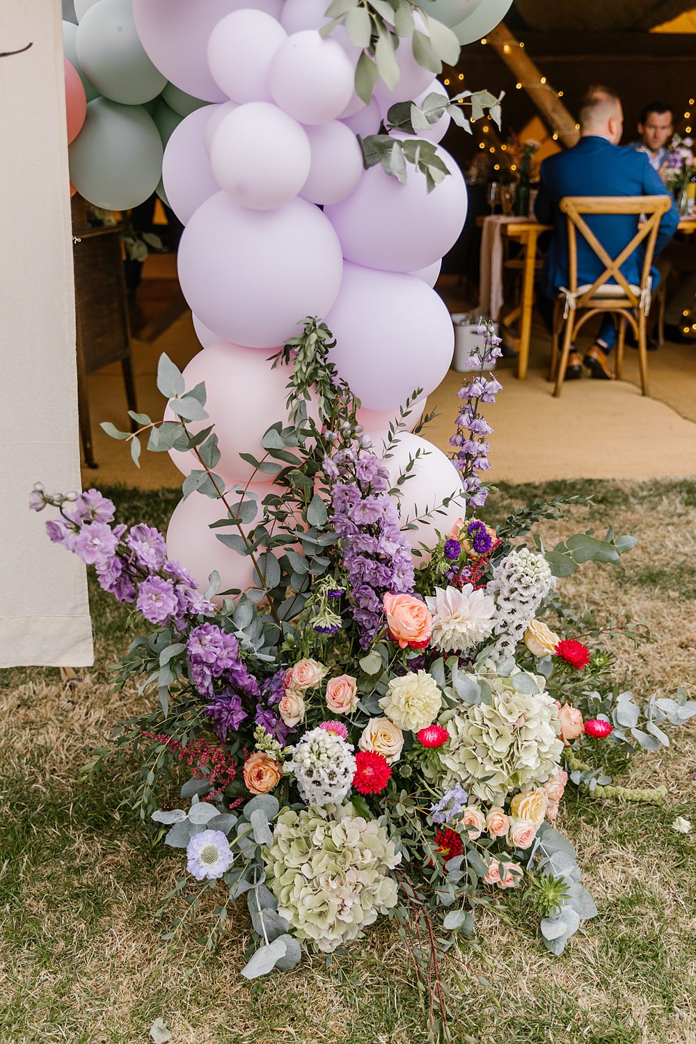 Flower Installation Arrangement Lilac Pink Delphinium Hydrangea Barnston Lodge Wedding Katherine Ashdown Photography