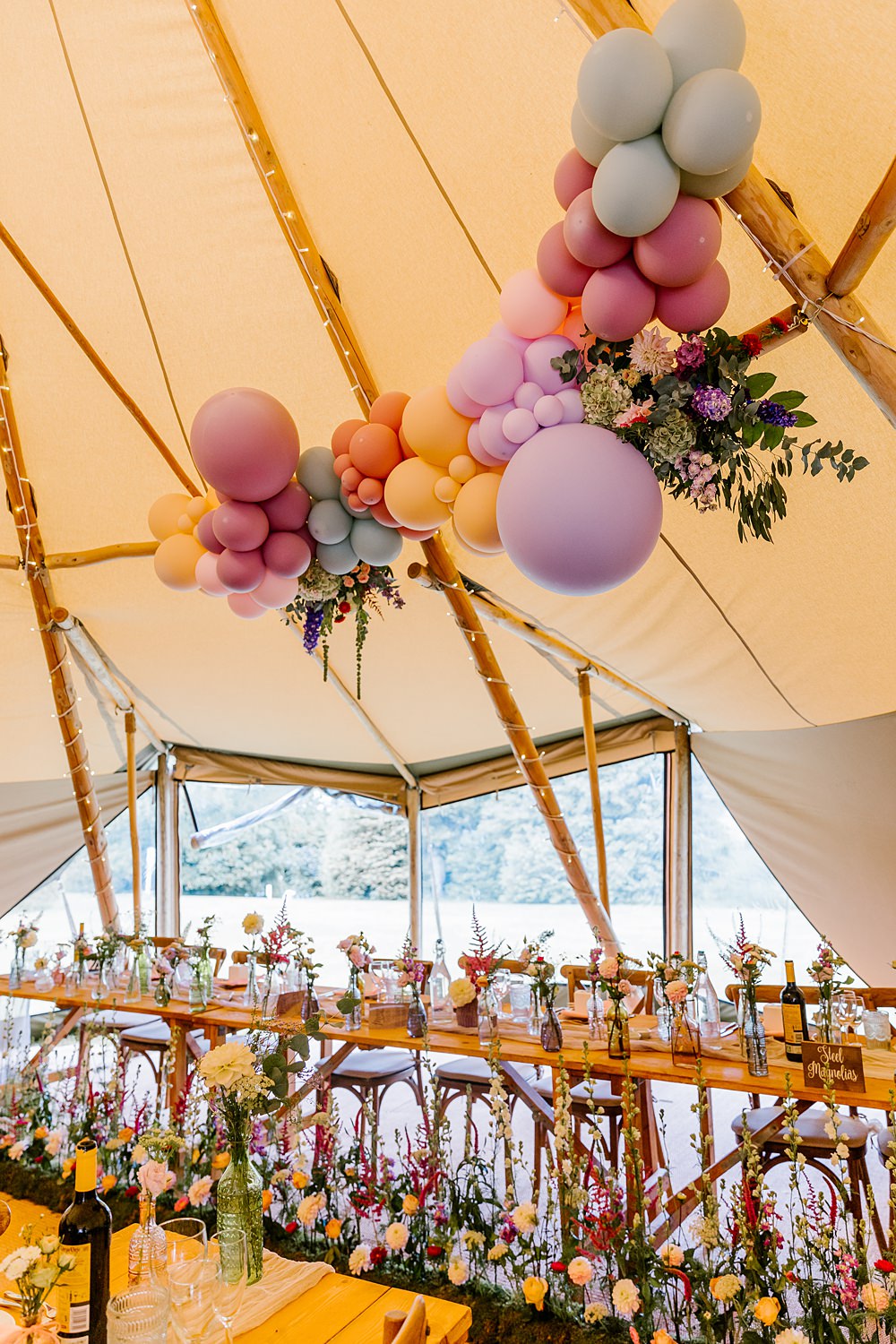 Tipi Balloon Decor Bottle Flowers Long Tables Barnston Lodge Wedding Katherine Ashdown Photography