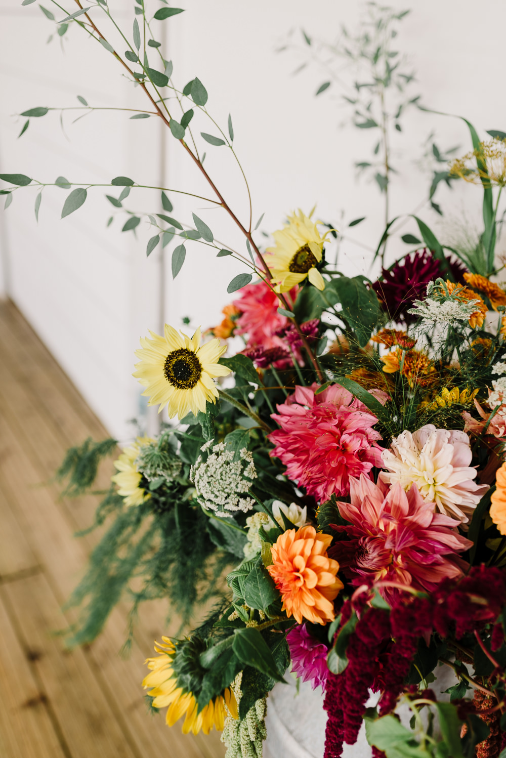 Colourful Wildflowers Autumn Sunflower Dahlia Greenery Bashall Barn Wedding Rachel Kenyon Photography