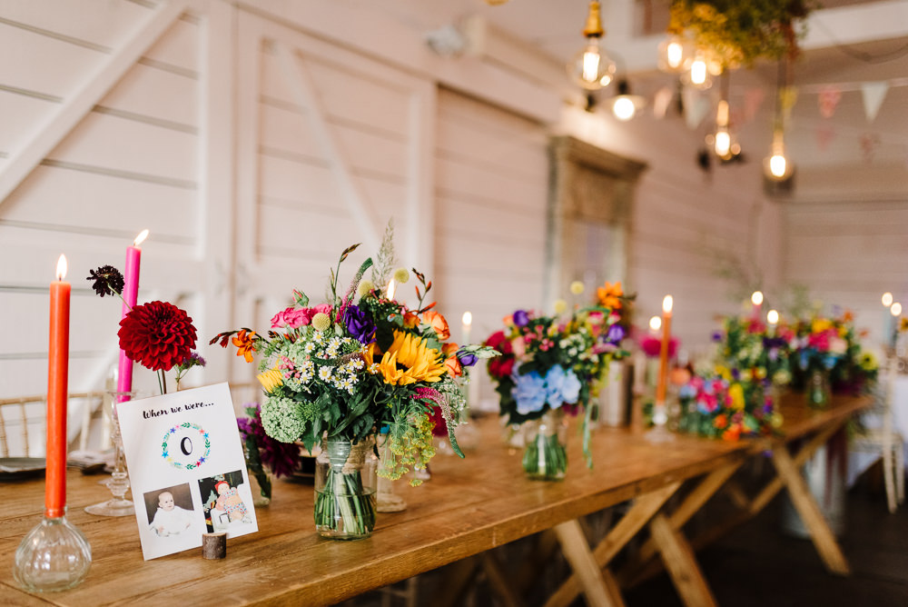 Table Decor Colourful Flowers Jars Centrepiece Candles Bashall Barn Wedding Rachel Kenyon Photography