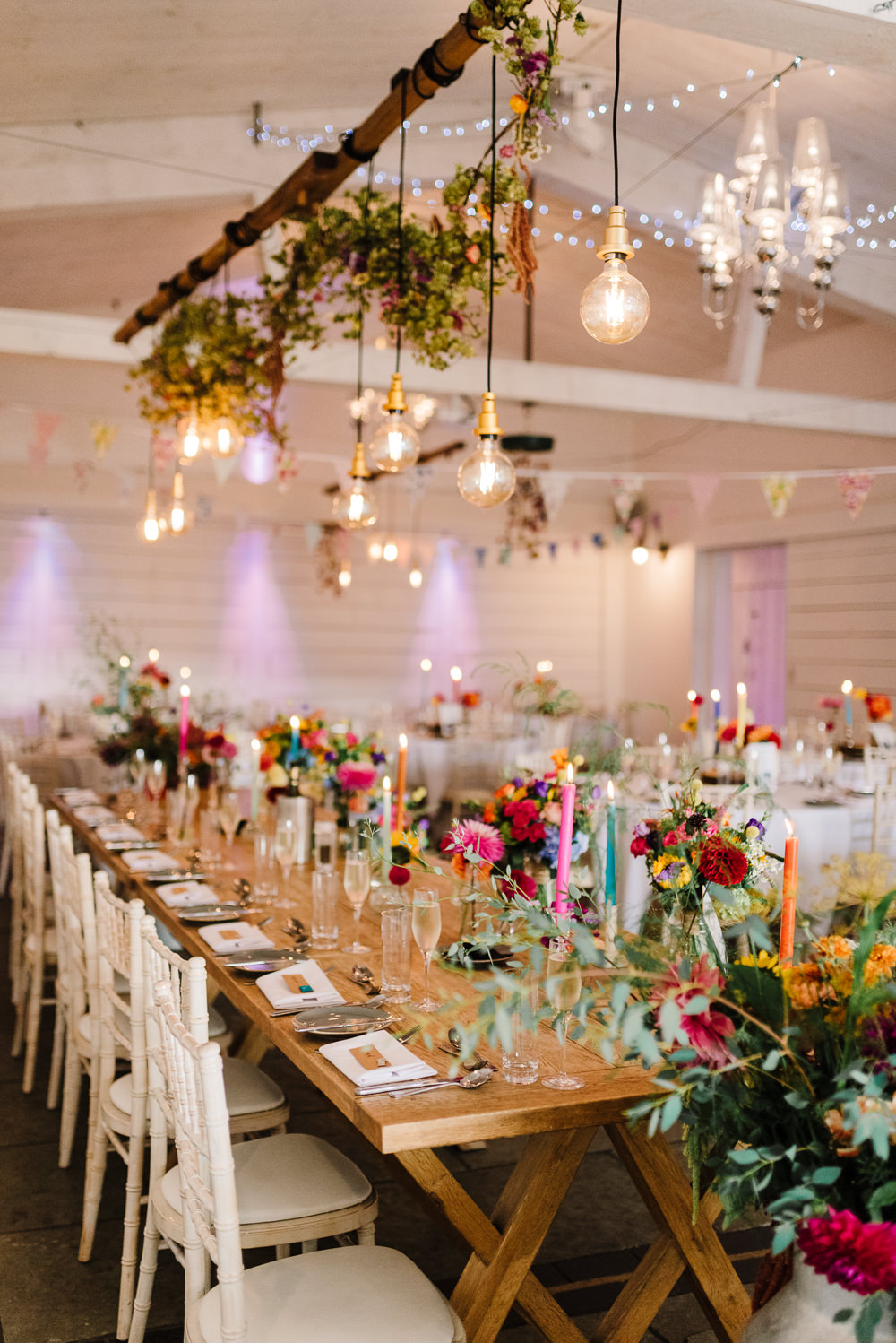 Colourful Flowers Bunting Candles Wedding Table Decorations Festoon Lights Bashall Barn Wedding Rachel Kenyon Photography