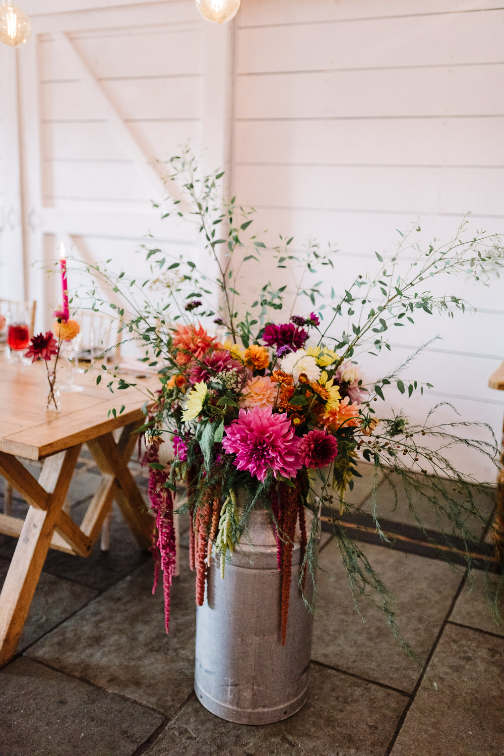 Milk Churn Flower Planter Autumn Flowers Dahlia Sunflower Amaranthus Bashall Barn Wedding Rachel Kenyon Photography