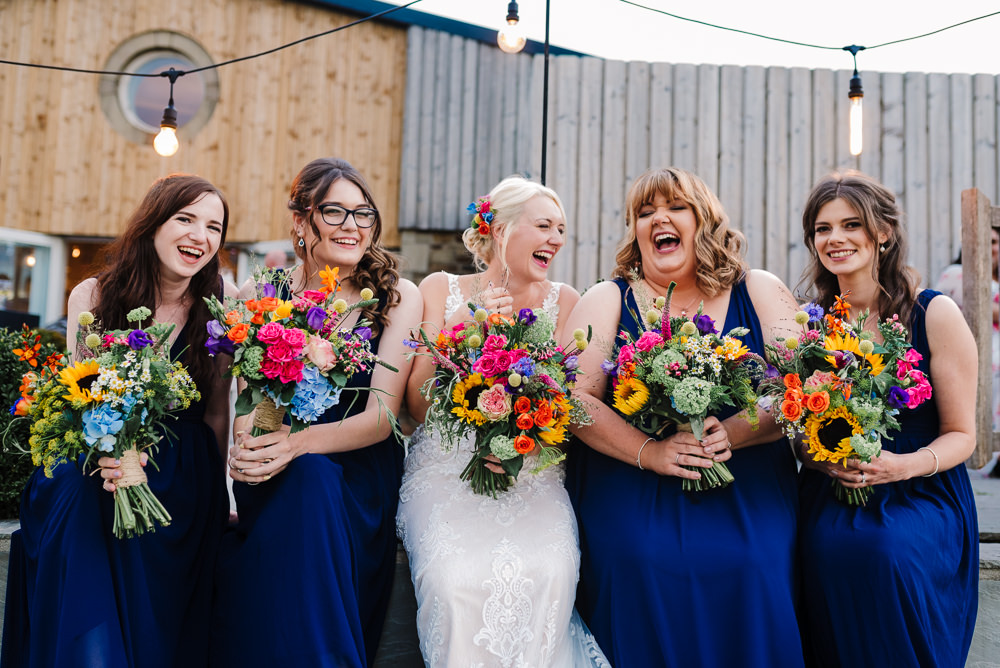 Navy Bridesmaid Dresses Colourful Bouquets Bashall Barn Wedding Rachel Kenyon Photography