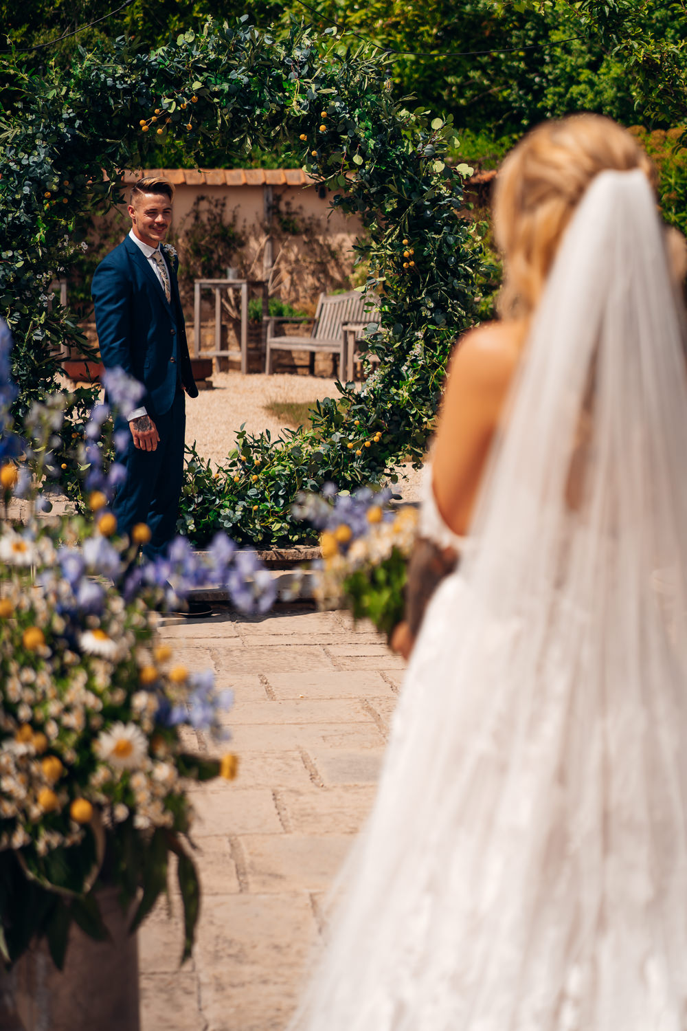 Ceremony Hoop Backdrop Flowers Blue Yellow Wedding Ideas EmilyCollettPhotography