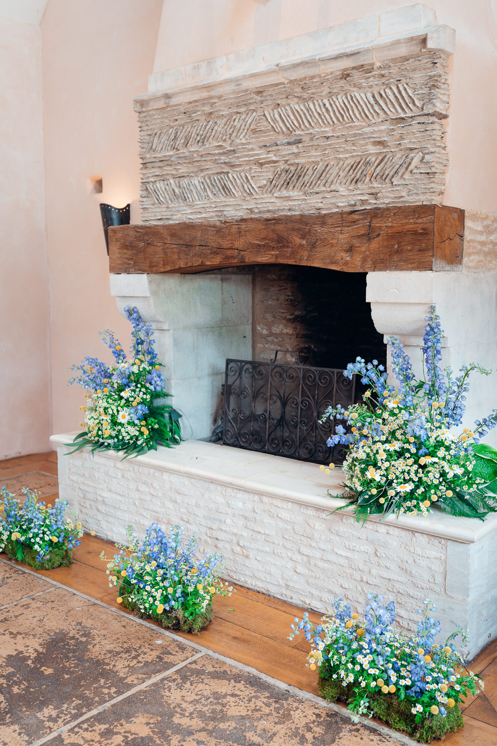 Craspedia Daisies Delphiniums Flowers Fireplace Blue Yellow Wedding Ideas EmilyCollettPhotography