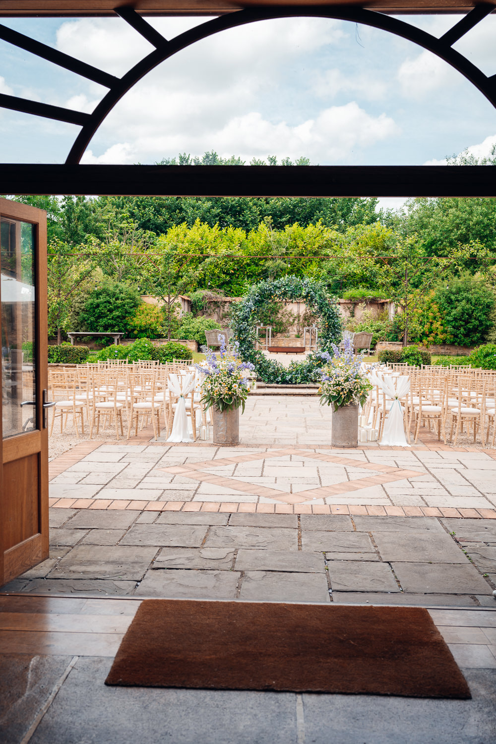 Greenery Hoop Moon Gate Greenery Flower Arch Ceremony Blue Yellow Wedding Ideas EmilyCollettPhotography