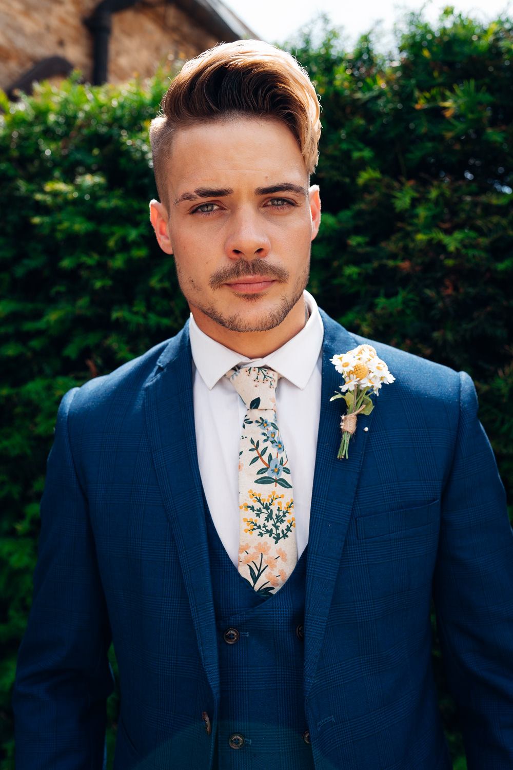 Groom Blue Suit Floral Tie Daisy Buttonhole Blue Yellow Wedding Ideas EmilyCollettPhotography