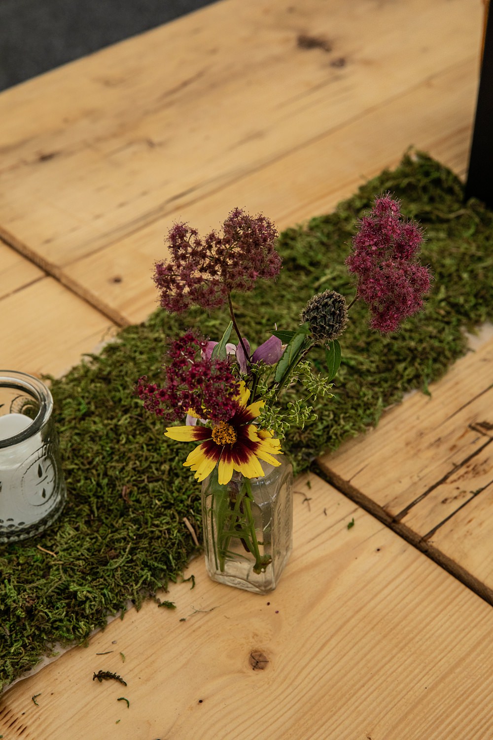 Table Flowers Bottles Moss Flaxbourne Gardens Wedding Lorna Newman Weddings