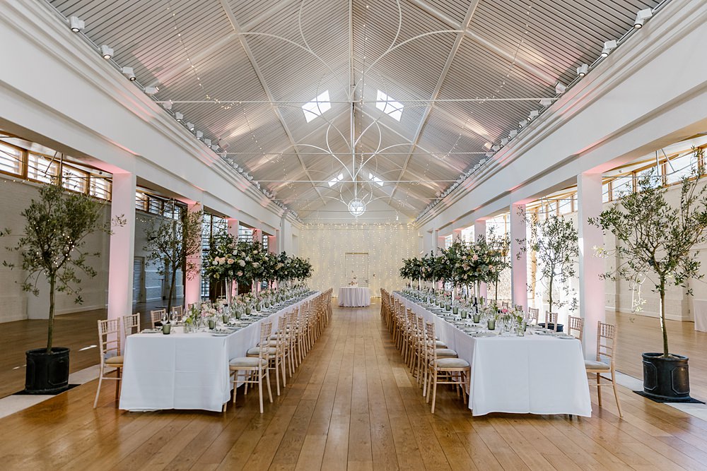 Long Tables Greenery Tall Flower Arrangements Pink Holkham Hall Wedding Katherine Ashdown Photography