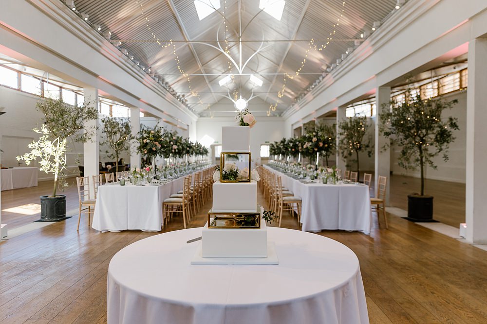 Long Tables Greenery Tall Flower Arrangements Pink Holkham Hall Wedding Katherine Ashdown Photography