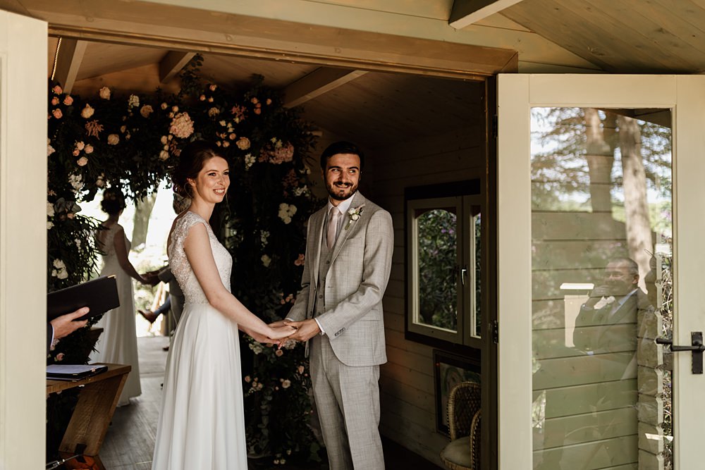 Flower Arch Backdrop Ceremony Love Shack Wedding Natalie Coultas Photography