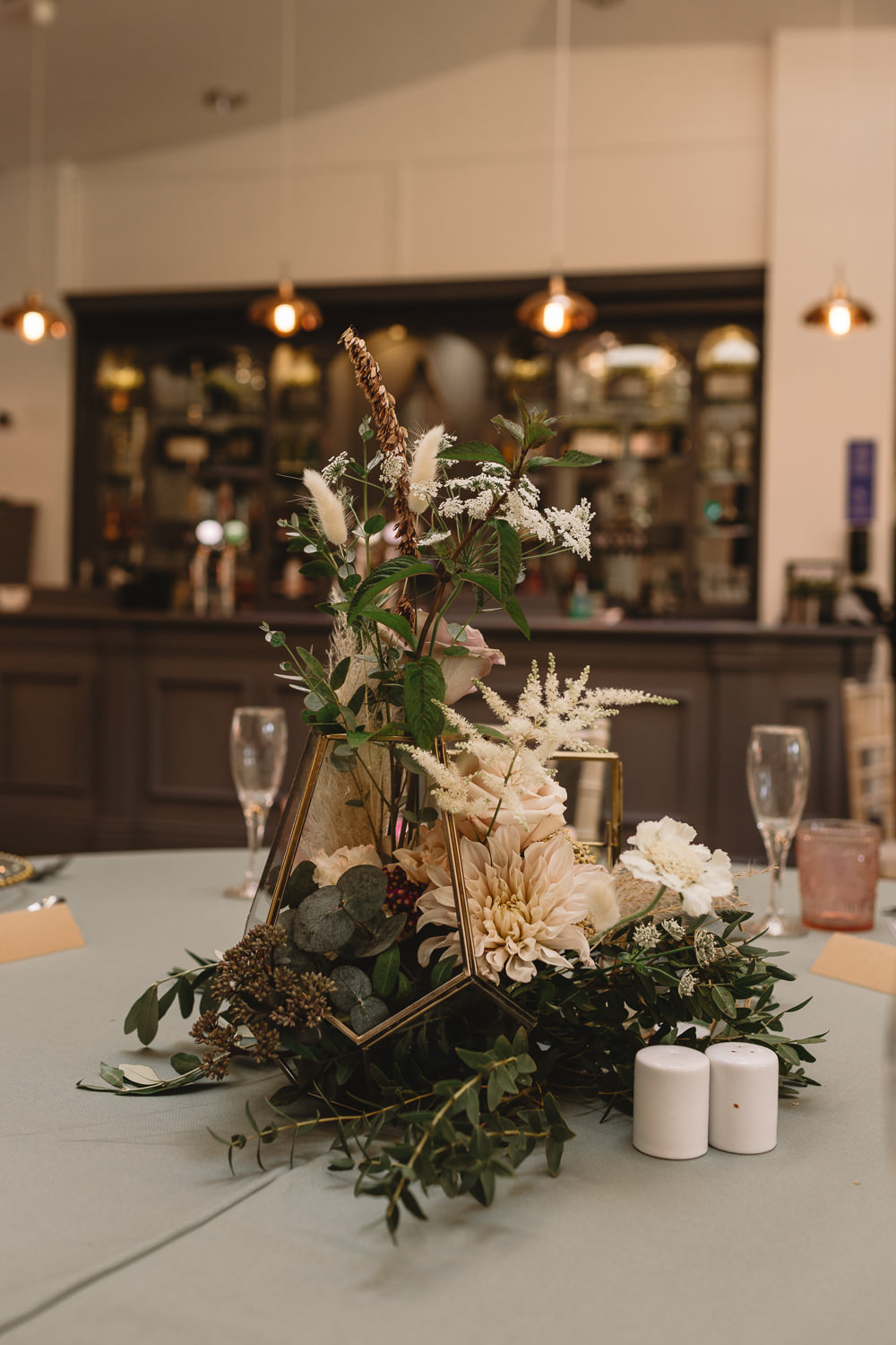 Green White Foliage Table Centrepiece Decor Greenery Grass Terrarium Green Sage Cloths Pumping House Ollerton Wedding Louise Barry Photographer Pumping House Ollerton Wedding Louise Barry Photographer