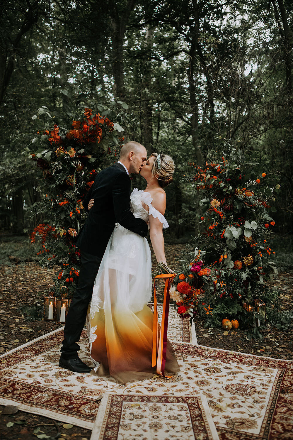 Flower Arch Installation Rug Aisle Ceremony Autumn Sustainable Woodland Wedding Charly Mae Photography