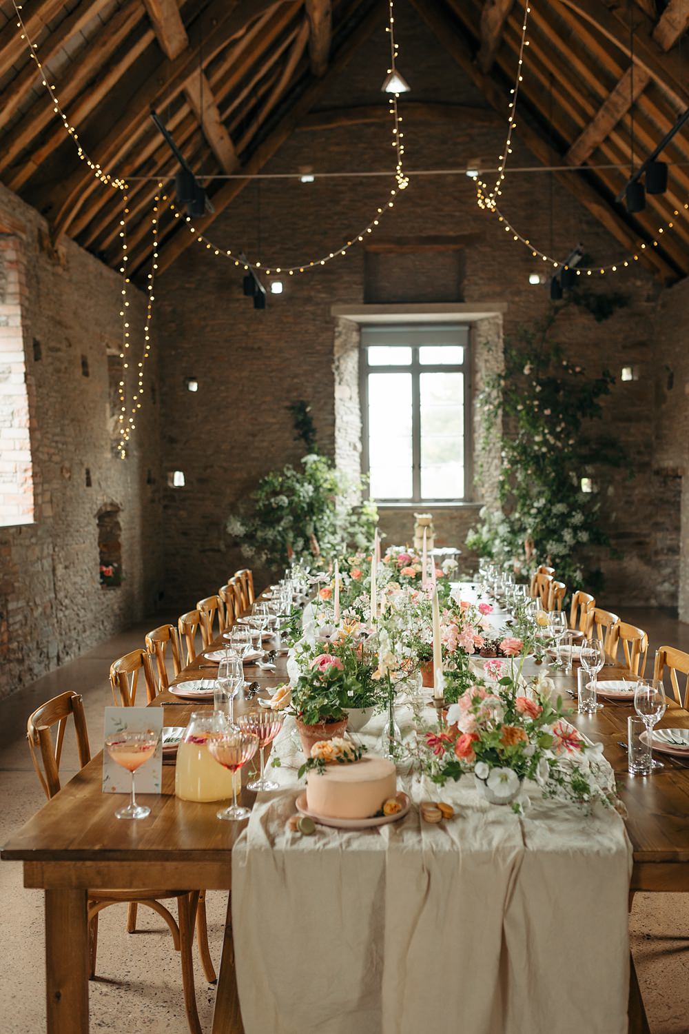 Fairy Lights Long Wooden Table Pink Flowers Bottles White Runner Candles Decor Barn Apricot Wedding Ideas Gem Hicks Photography