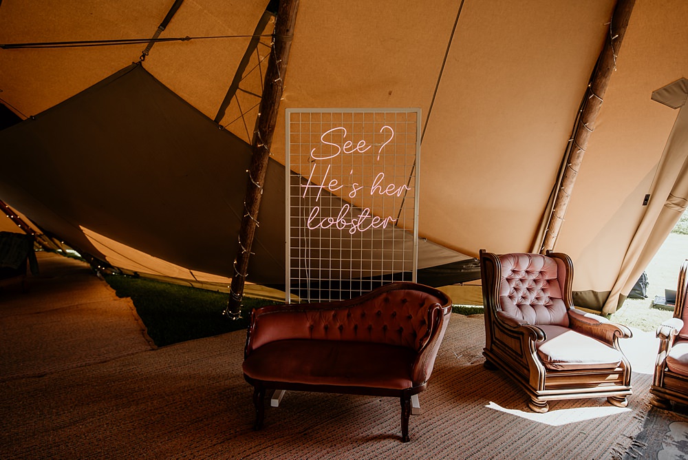 Neon Sign Backdrop Bohemian Tipi Wedding MattMoore Photography