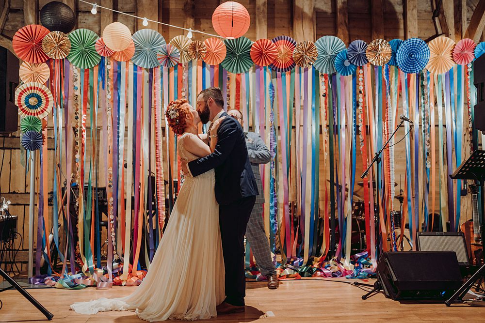 Colourful Paper Lanterns Festoon Lights Decor Ribbon Backdrop Streamer Bright Barn Wedding Kim Williams Weddings