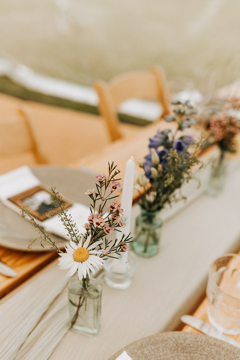 Centrepiece Table Flowers Bottles Elford Hall Garden Wedding Wyldbee