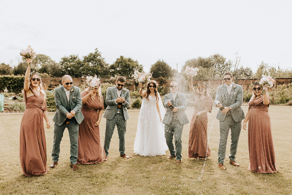 Champagne Pop Spray Elford Hall Garden Wedding Wyldbee
