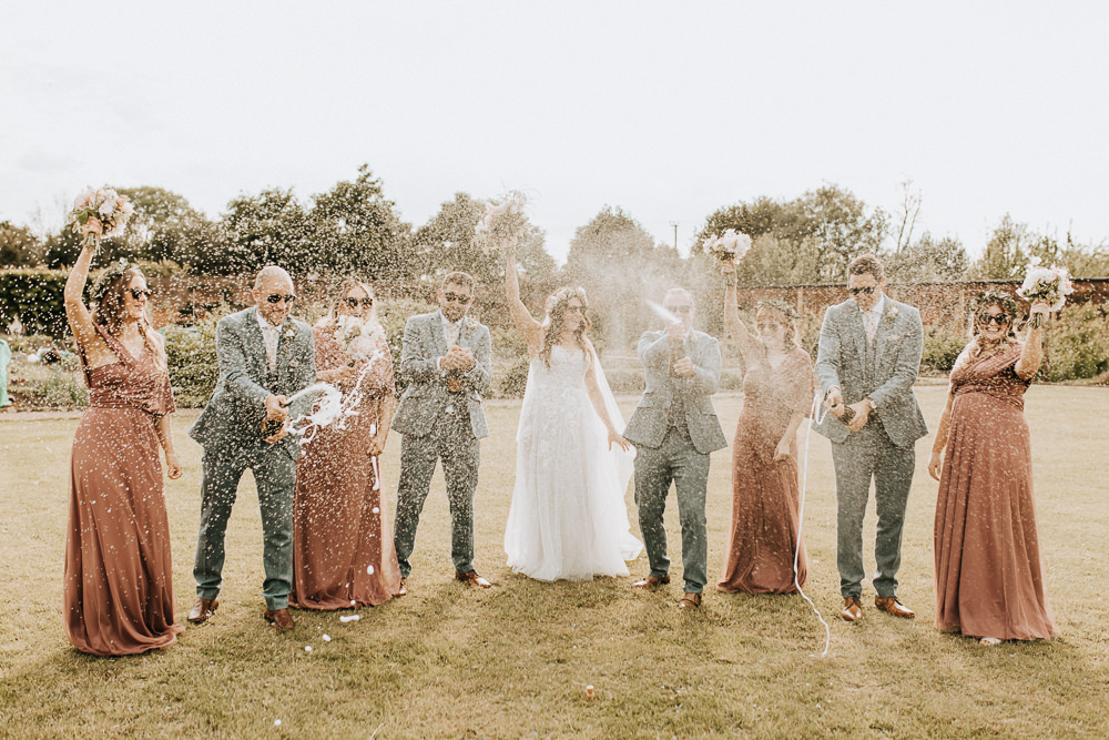Champagne Pop Spray Elford Hall Garden Wedding Wyldbee