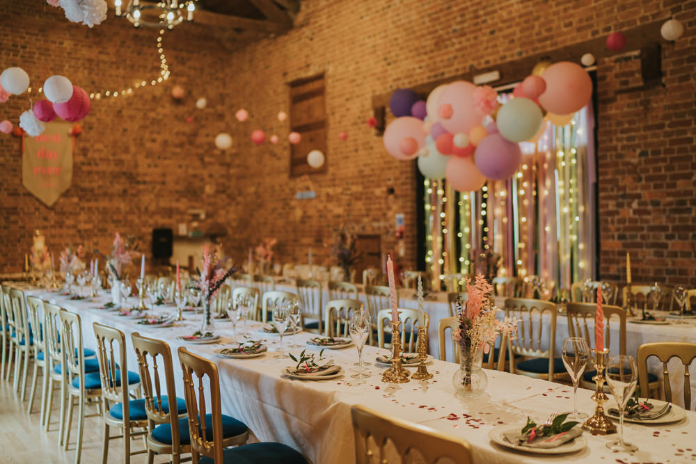 Pastel Balloon Ribbon Backdrop Top Table Barn Iridescent Wedding Dress Grace Elizabeth Photography