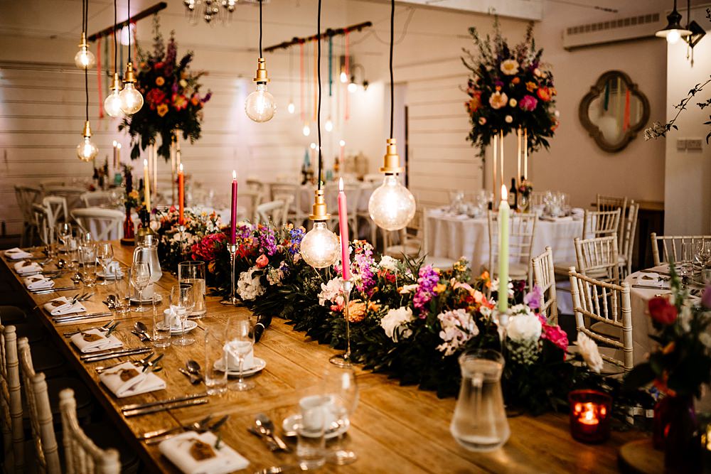 Top Table Colourful Ribbon Backdrop Festoon Lights Colourful Flowers Runner Lancashire Barn Wedding Beth Alderson Photography