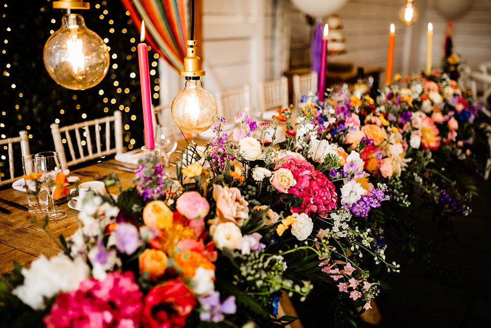 Top Table Colourful Ribbon Backdrop Festoon Lights Colourful Flowers Runner Lancashire Barn Wedding Beth Alderson Photography