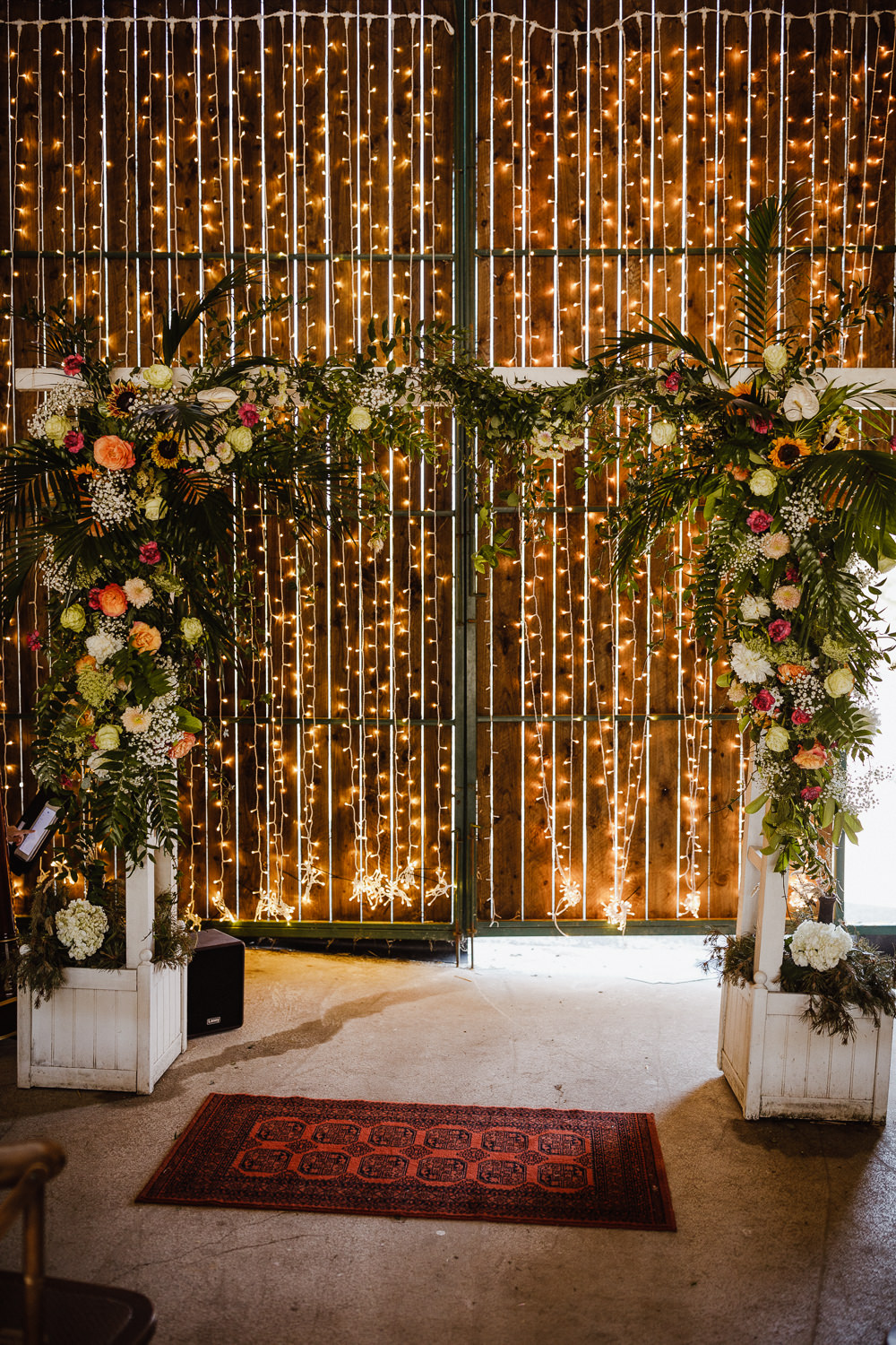 Flower Arch Ceremony Backdrop Fairy Light Curtain North Yorkshire Barn Wedding Photography34