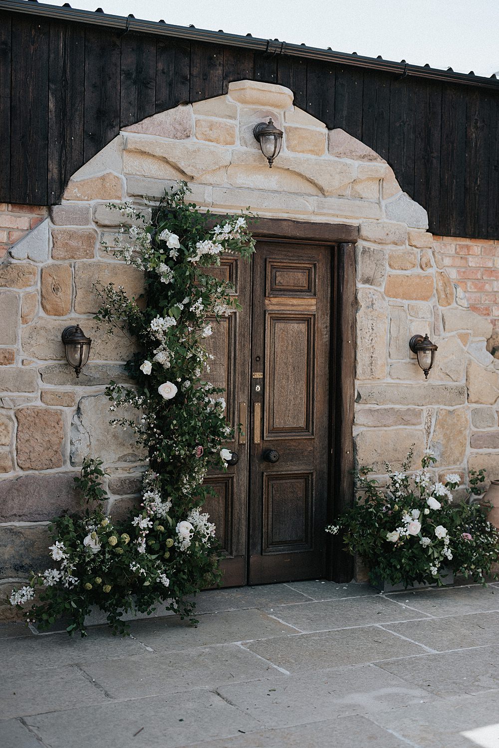 Willow Marsh Farm Wedding Matt Horan Photography Flower Installation Pillars Door Greenery White