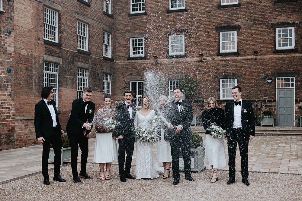 Champagne Pop Spray Winter Wedding West Mill Matt Horan Photography